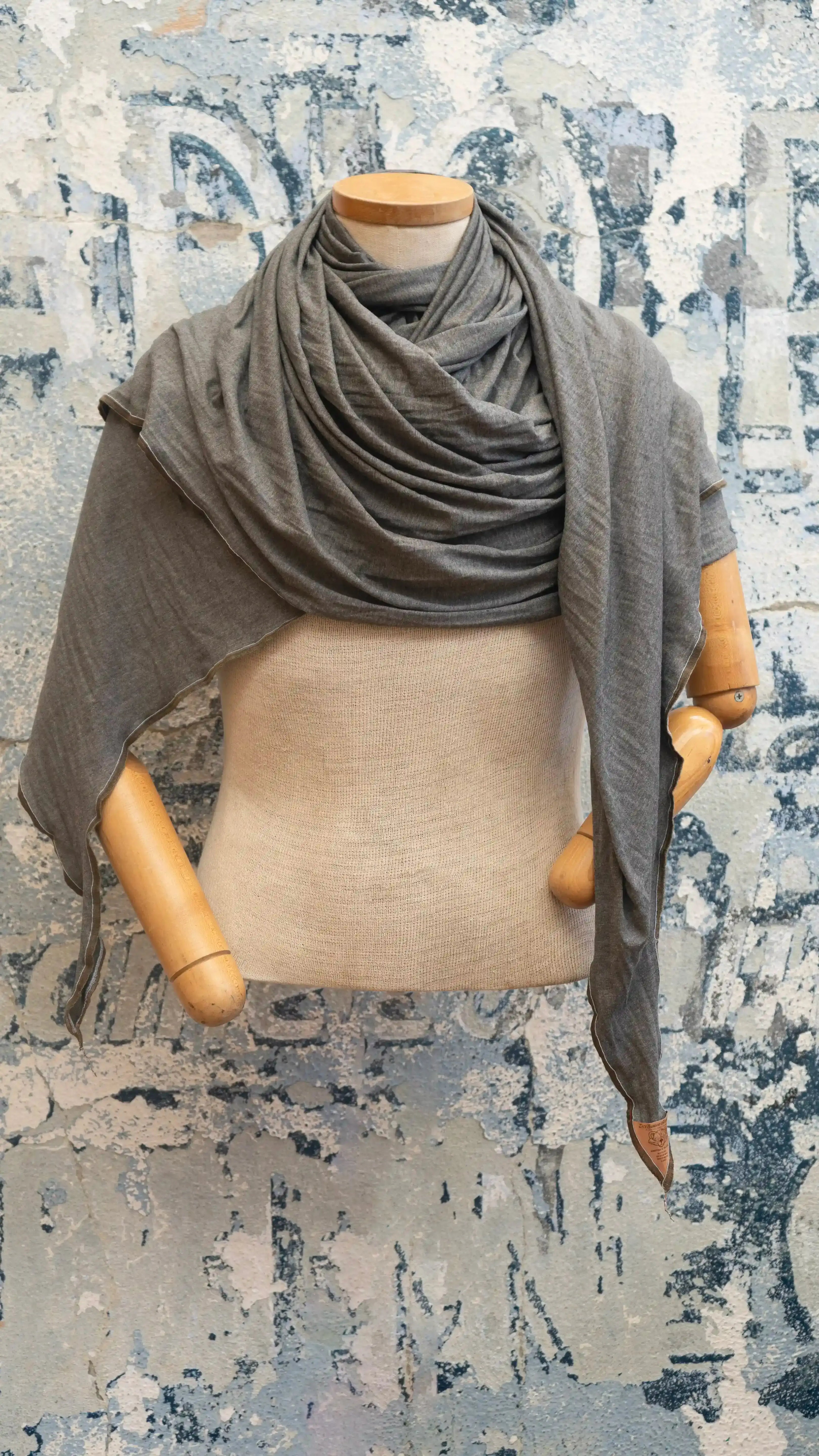 Soft hand-cut scarf showing fabric weave and craftsmanship
