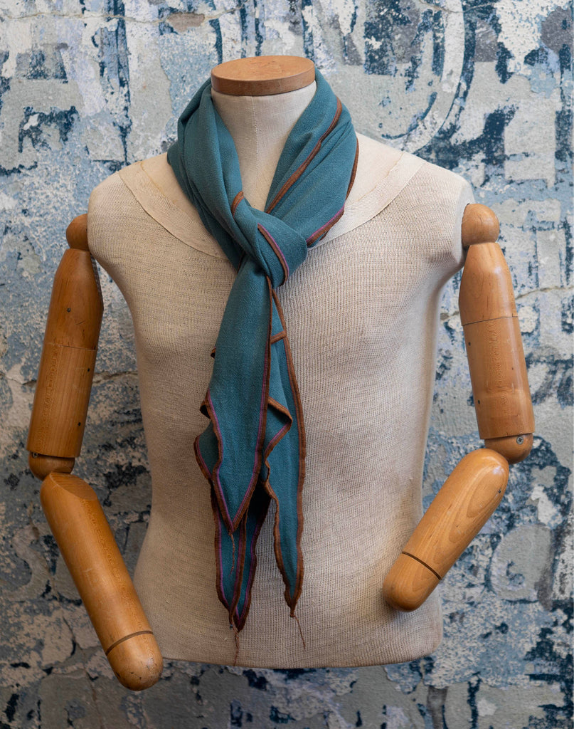 Teal Crossroads Linen Scarf folded neatly showcasing texture