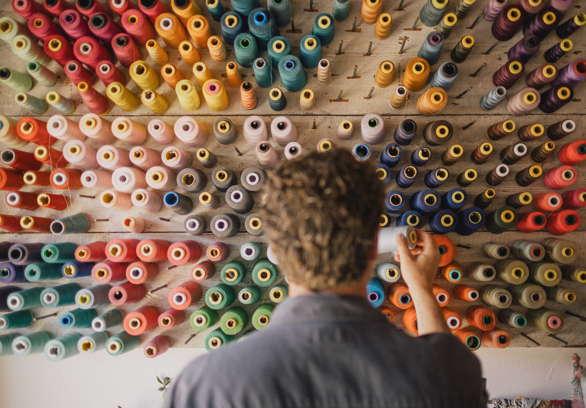 The whimsical art of creating a scarf.