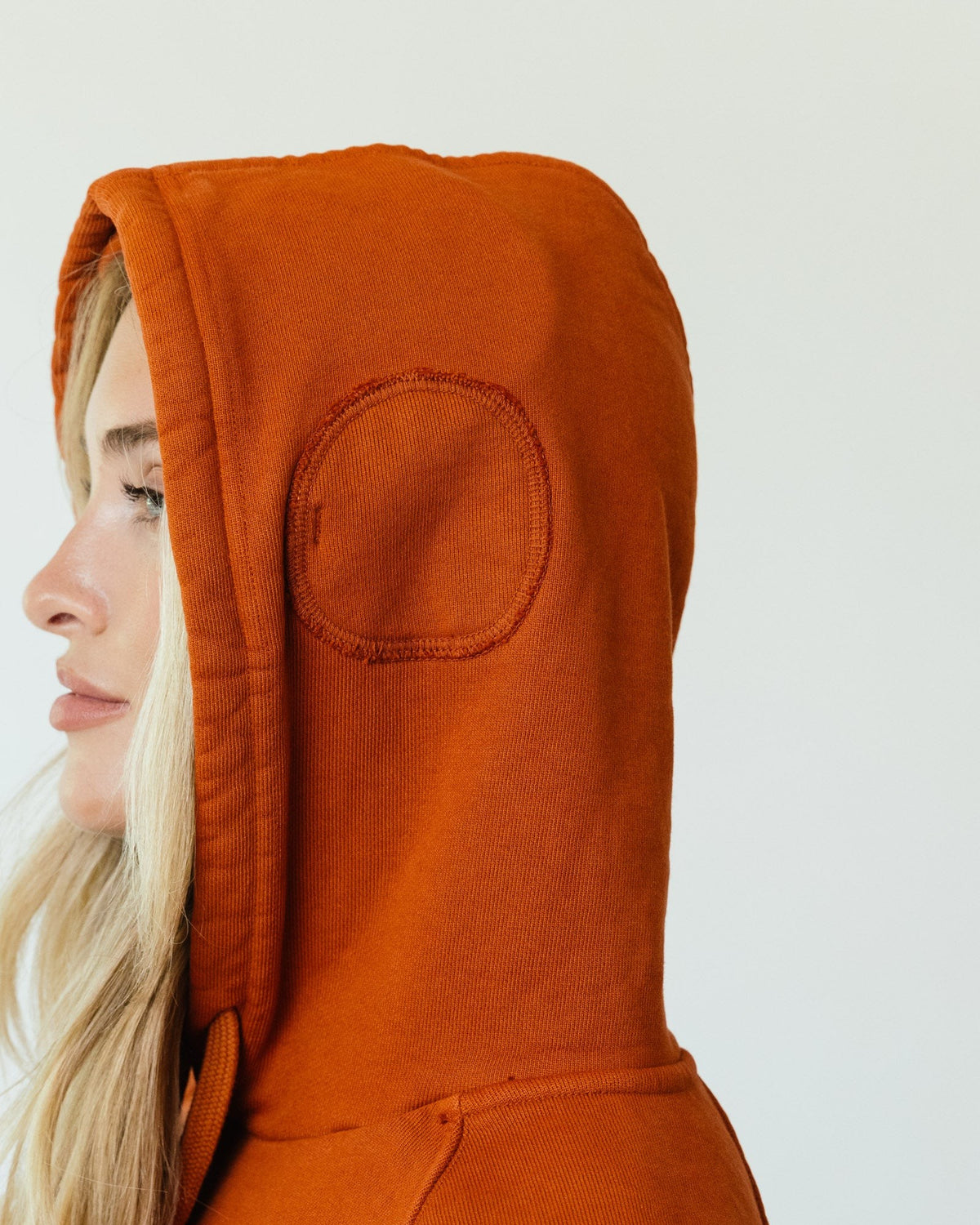 The extra layer stitched over the ear inside the Apollo X hood